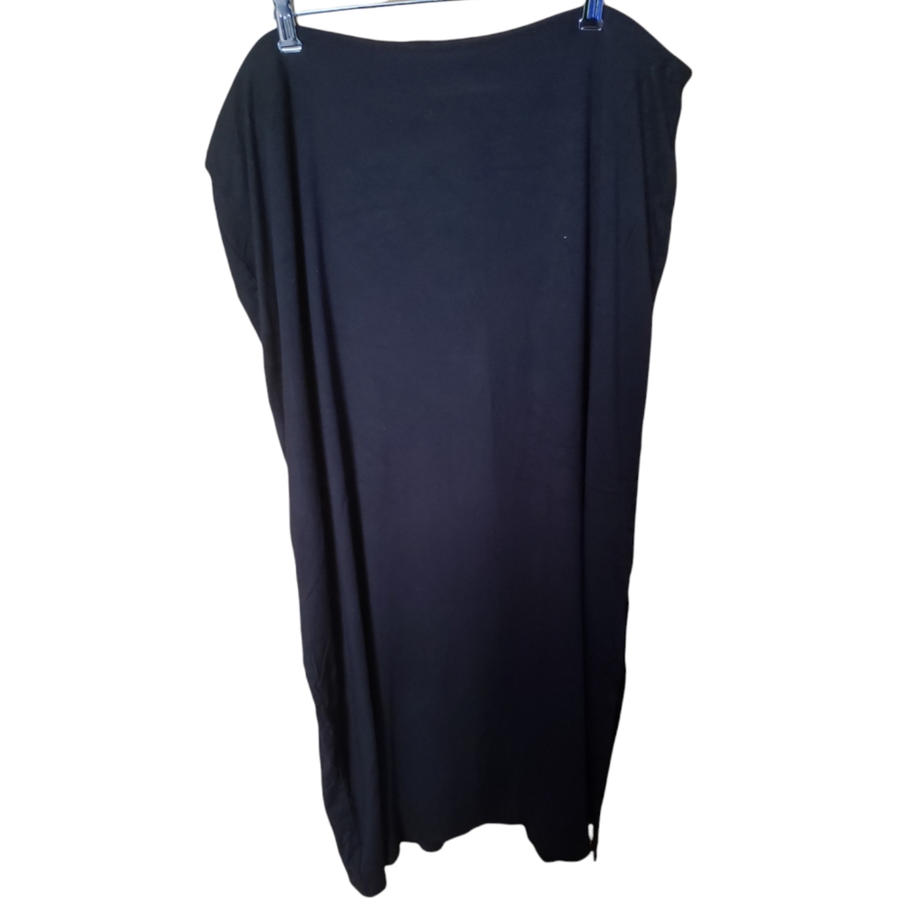 Woman's black stretch long skirt with side slit and elastic waist.